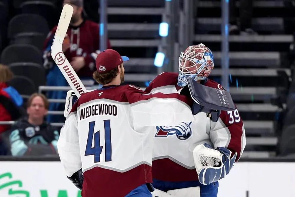 Scott Wedgewood and Mackenzie Blackwood celebrate a win in December.
