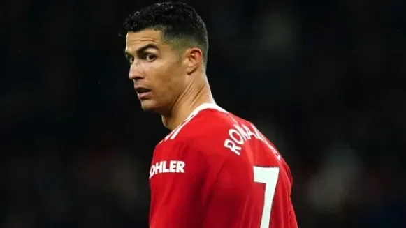 Cristiano Ronaldo, wearing United's legendary red No.7 shirt, looks over his shoulder during a game