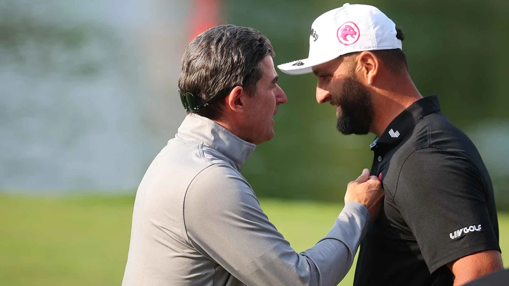 Jon Rahm of Legion XIII celebrates with CEO of LIV Golf, Scott O'Neil after winning the final round of LIV Golf Mexico City at Club de Golf Chapultepec